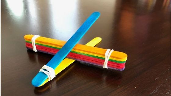 Popsicle Stick Catapult Put Stack Between Two Sticks