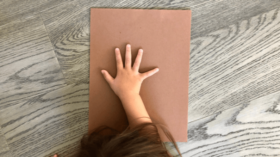 Place Hand on Paper