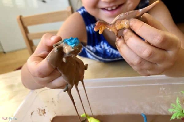 Chocolate Oobleck Dripping Dinosaur