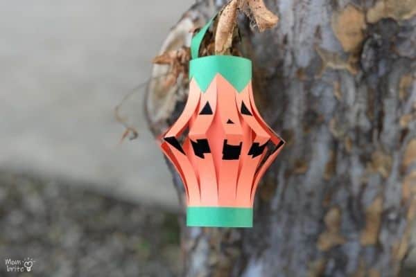 Pumpkin Lantern Hanging on Tree