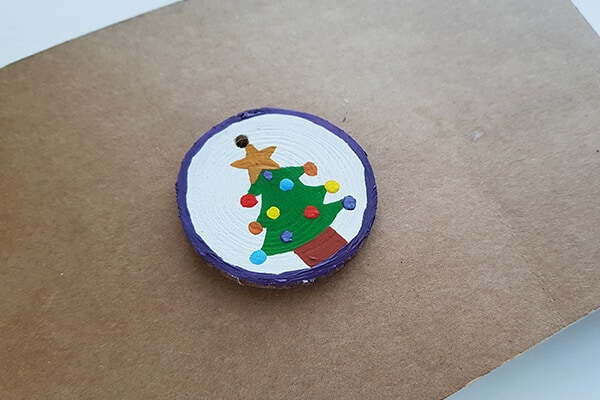 Round wood slice christmas tree designs fill with multiple Acrylic paints