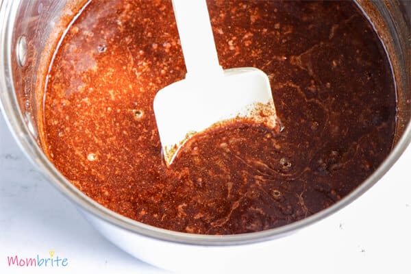 gingerbread mixture stir with spoon in medium saucepan