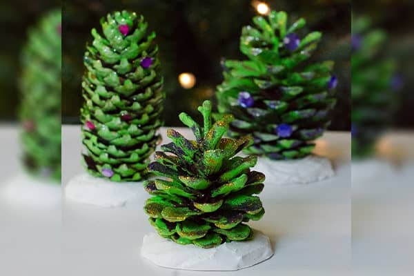 Hand made green coloured pinecone craft-min