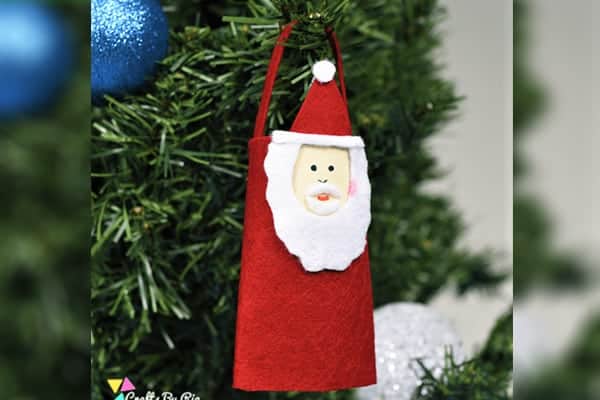 Hnad made paper roll santa craft on chritmas tree