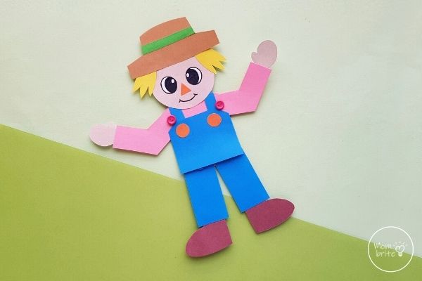 Paper Scarecrow Craft on Green Background