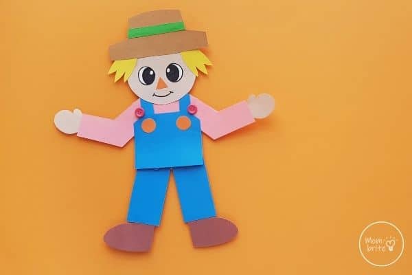 Paper Scarecrow Craft on Orange Background