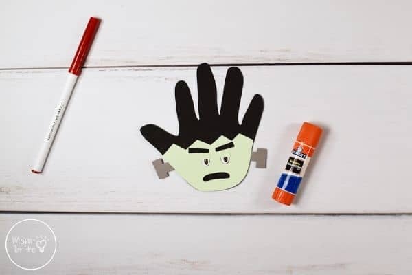 Frankenstein Handprint Craft Glue Eyebrows to Face