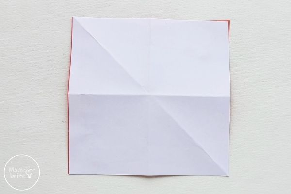 Origami Santa Claus Flip Paper to White Side