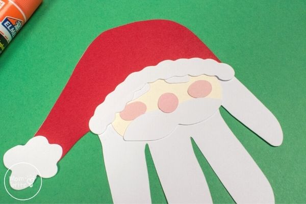 Santa Handprint Craft Glue Mustache, Nose, and Cheeks