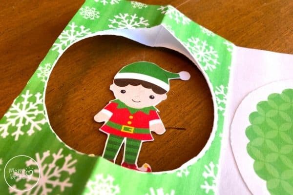 Spinning Elf Christmas Card Place Thread Through Top and Bottom