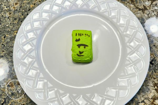 Place Frankenstein Marshmallow Peep in Microwavable Plate