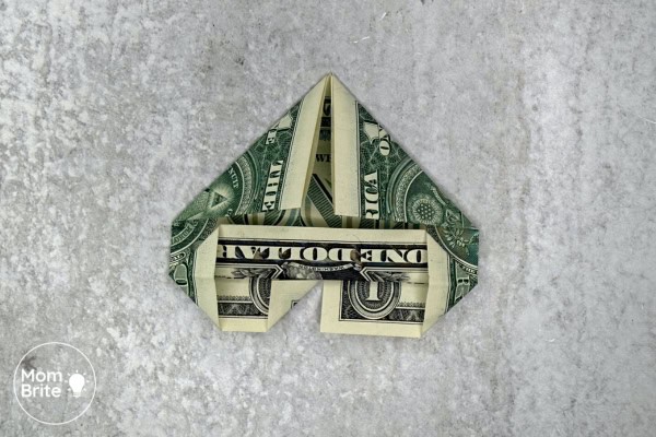 How to Make a Dollar Bill Origami Heart (Easy Money Folding Tutorial) Origami Heart Dollar - Fold middle corner upward on left side