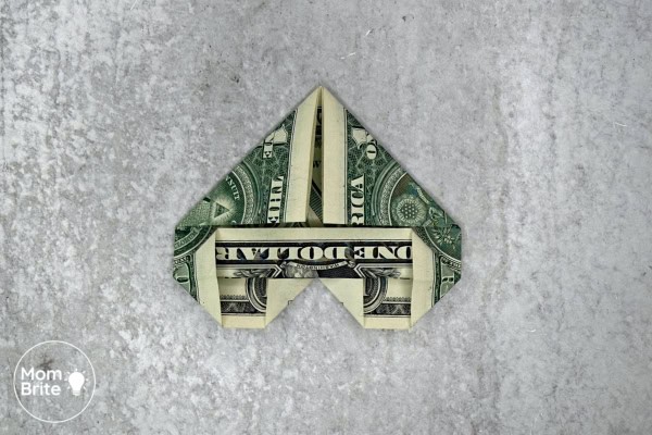 How to Make a Dollar Bill Origami Heart (Easy Money Folding Tutorial) Origami Heart Dollar - Fold middle corner upward on right side