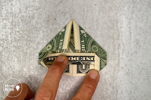 How to Make a Dollar Bill Origami Heart (Easy Money Folding Tutorial) Origami Heart Dollar - Press down right opening to form a triangle