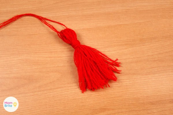 Finished red yarn tassel for Thing 1 and Thing 2 bookmark